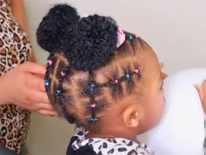 peinado afro niña con moñitos gemelos